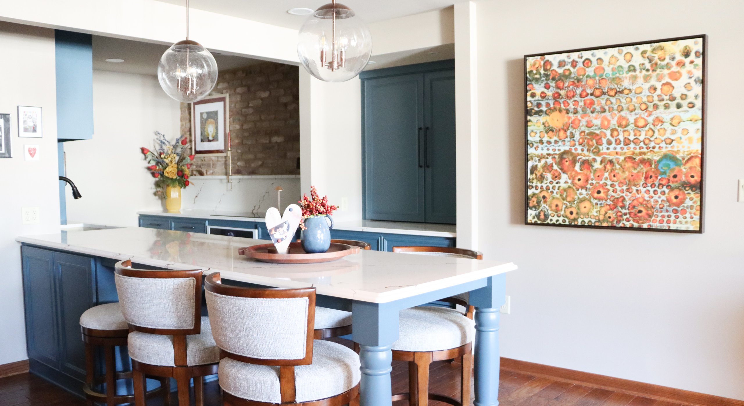 Teal and orange interior of a bold reclaimed condo in downtown Lincoln, Nebraska, near the Rococo Theatre.