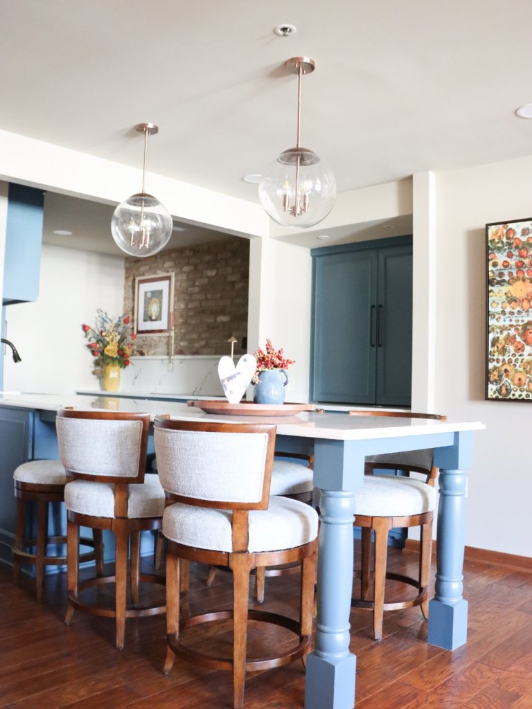 Full view of kitchen remodel featuring custom blue cabinetry in Lincoln condo.