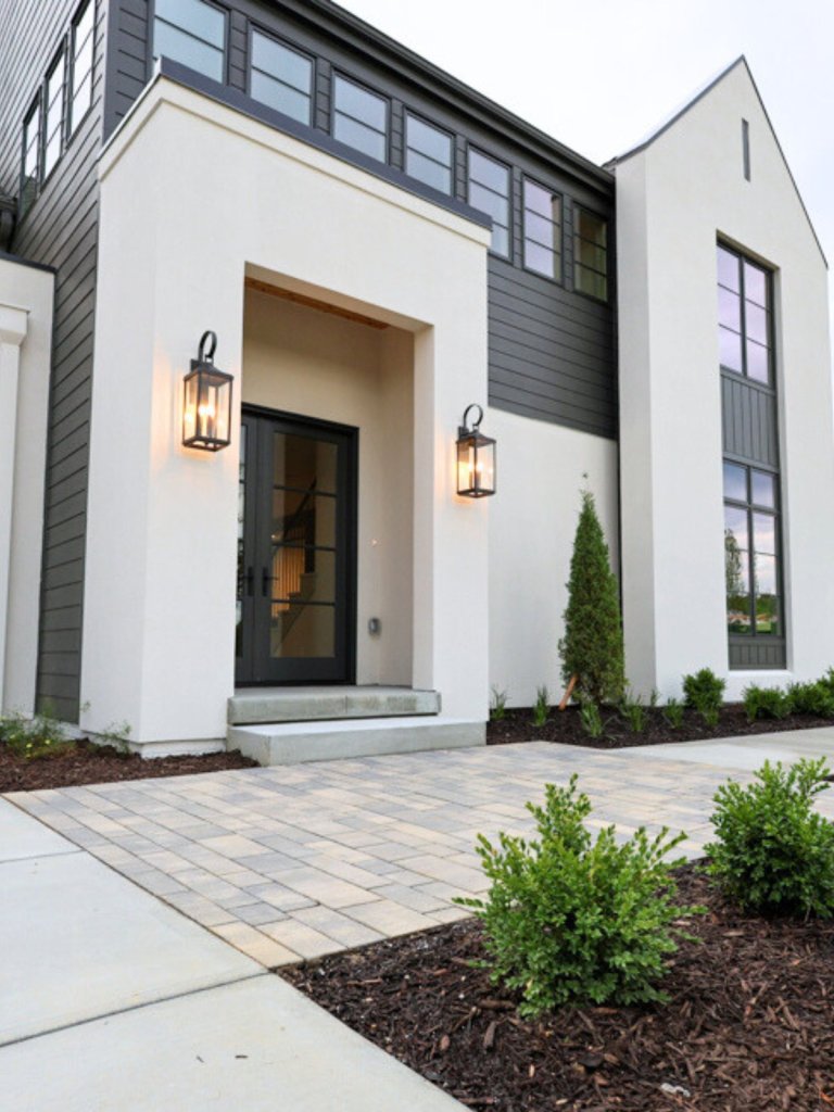 Exterior of new construction home in Sanctuary Ridge, Elkhorn, designed by Cura and Dot Interior Design Studio