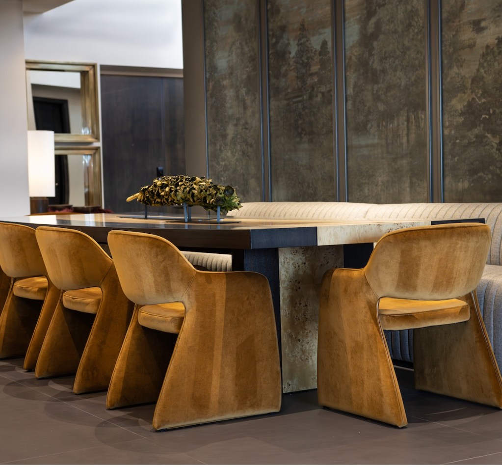 Custom dining area with rich textures and striking decor in a downtown Omaha condo.