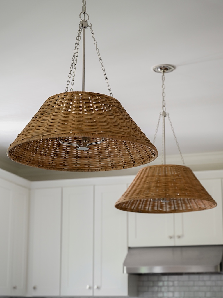 Natural woven accent lighting over island